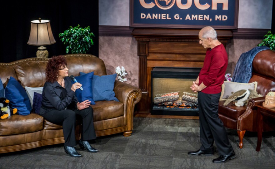 A guest interacts with Dr. Daniel Amen on the set of "On The Psychiatrist’s Couch." In his 10th national public television special Dr. Amen gives viewers the most important lessons he has taught thousands of patients over the last 35 years. 