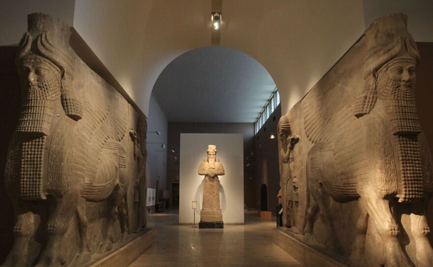 Assyrian artifacts are displayed at Iraq's National Museum in Baghdad in 2016. The $30 million sale of a 3,000-year-old Assyrian relief is sparking concern that similar artifacts will be looted.