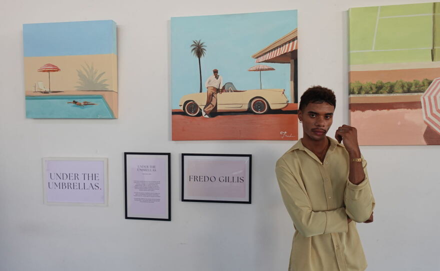 Fredo Gillis stands in front of his paintings at San Diego Made Factory on Sept. 22, 2026.