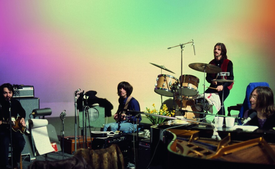 The Beatles on Mount Doom (or a still from Peter Jackson's <em>Get Back</em>, a documentary constructed from footage shot during the making of the band's last studio albums and final performance).