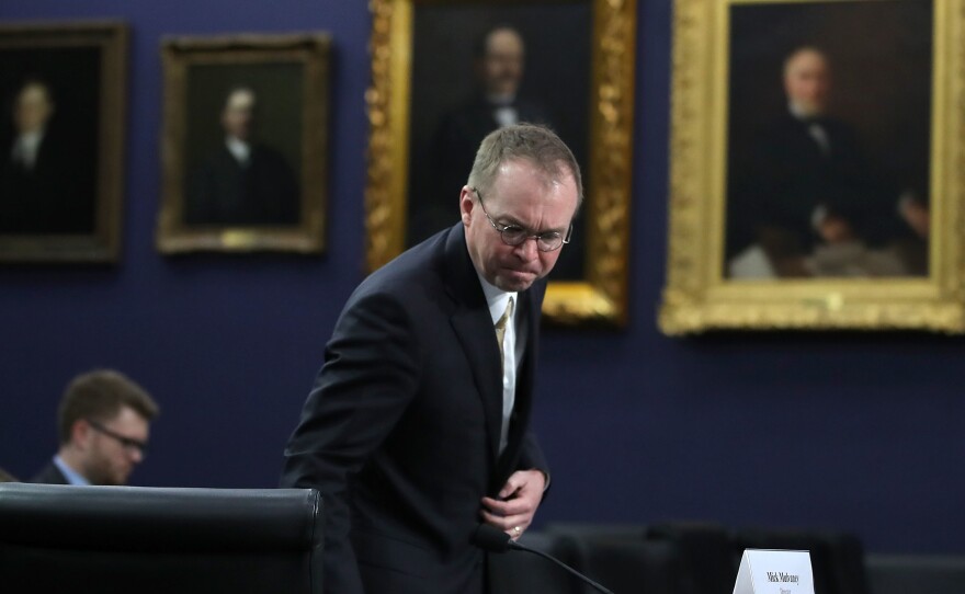 Mick Mulvaney, the acting head of the Consumer Financial Protection Bureau, seen at a House committee hearing earlier this year. Under Mulvaney, the bureau has scaled back its enforcement of rules against predatory lenders.