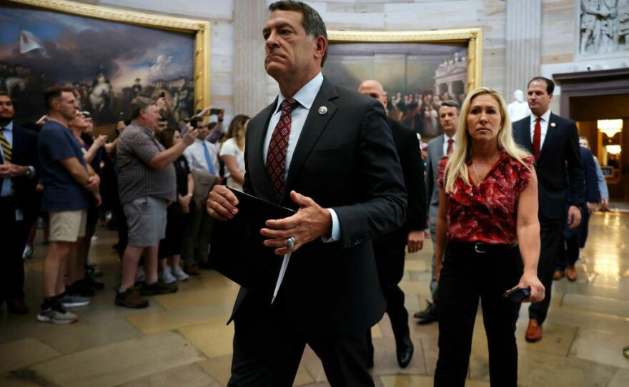 House Homeland Security Committee Chairman Mark Green, R-Tenn., Rep. Marjorie Taylor Greene, R-Ga., and their fellow Republican impeachment managers walk back through the U.S. Capitol Rotunda after transmitting articles of impeachment against Homeland Security Secretary Alejandro Mayorkas to the Senate on Tuesday.