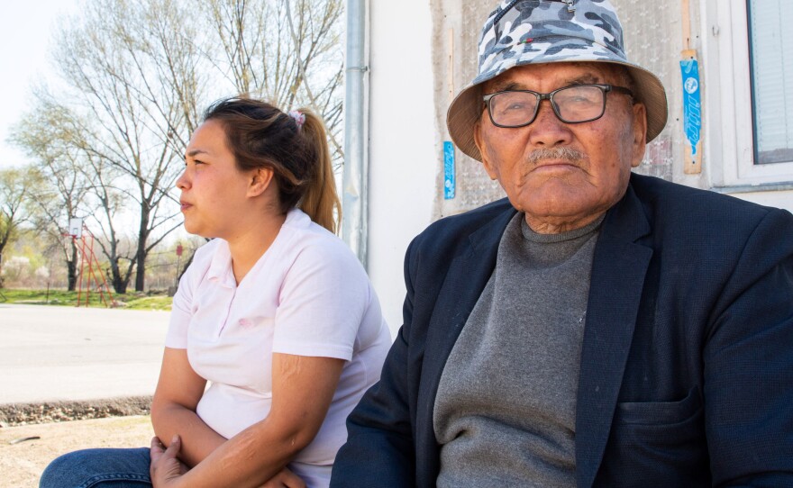 Afghan Masouma Musavi, 24, and her father Reza Musavi, 85, sit in the Krnjaca asylum center near the Serbian capital Belgrade. They arrived in the country with Masouma's mother and daughter in 2017, after walking across Iran.