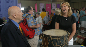 William Guthman (left) appraises a Taylor-Cass campaign drum.