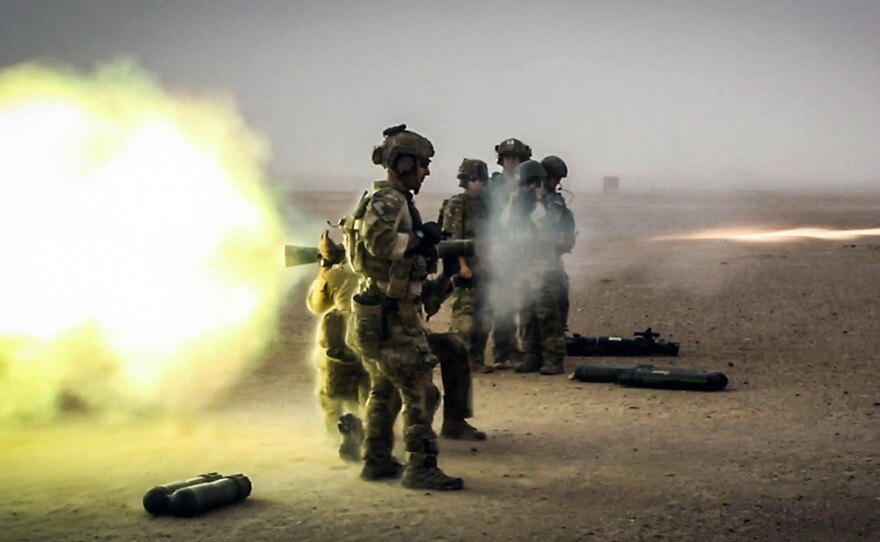 Coalition forces fire a Carl Gustaf recoilless rifle during a training exercise in Afghanistan's Helmand province in 2013.