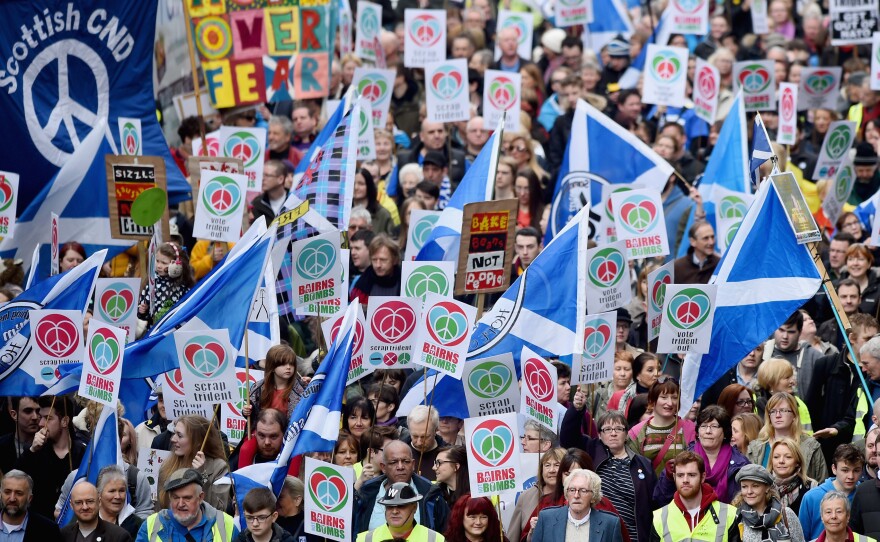 Demonstrators march in Glasgow, Scotland, to call for the scrapping of Britain's Trident nuclear weapons program on April 4. Opposition to Trident is a cornerstone of the SNP's platform.