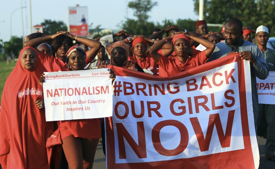 #BringBackOurGirls" campaigners participate in a lamentation parade, as more towns in Nigeria come under attack from Boko Haram in Abuja, in early Nov.ember 3, 2014.