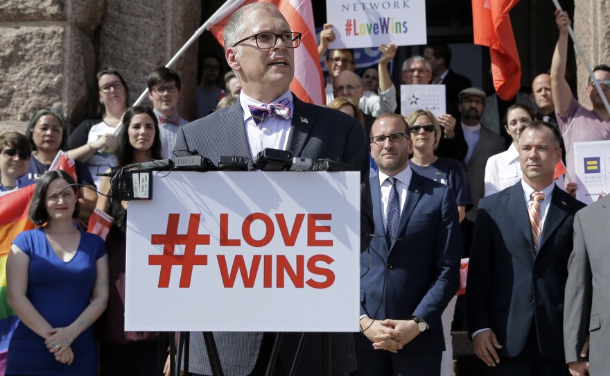 Jim Obergefell, the named plaintiff in the <em>Obergefell v. Hodges</em> Supreme Court case that legalized same-sex marriage, stands at the Texas Capitol during a rally on June 29, 2015.