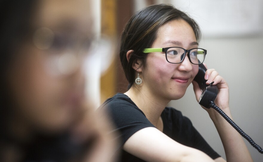 Yvonne Cui, a senior at San Gabriel High School, makes a call in Mandarin during a phone bank shift reminding people to vote at the Asian Americans Advancing Justice Los Angeles on Monday evening, May 23, 2016. Monday was the final day to register to vote in Los Angeles County before the primary election in June.