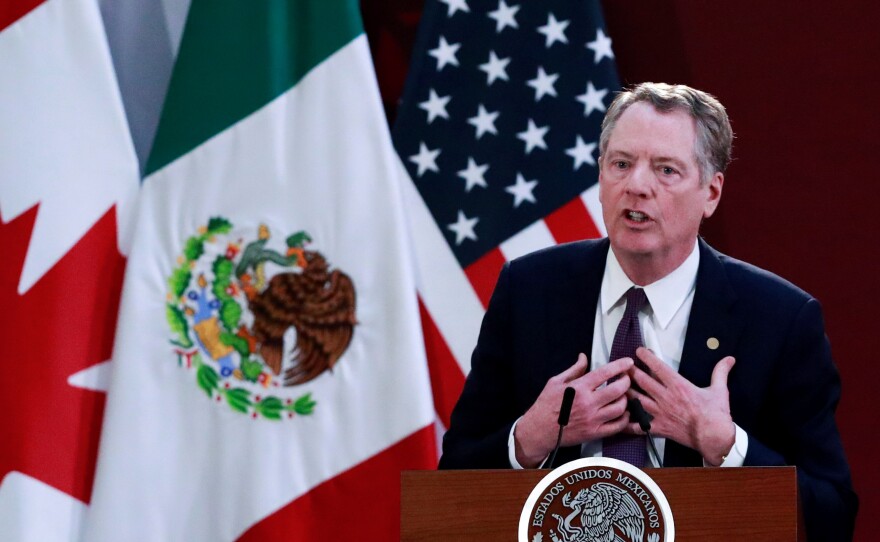 U.S. Trade Representative Robert Lighthizer speaks Dec. 10 in Mexico City during an event to sign an updated trade agreement between the U.S., Canada and Mexico. It was just one development in a week that exposed deep cracks in the global trading system.