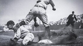 Charles M. Conlon's famous picture of Ty Cobb stealing third base during the 1909 season.