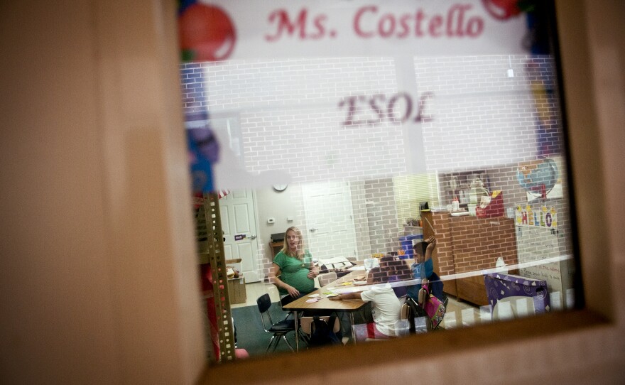 Costello teaches English as a second language to children in a suburban Washington school district.