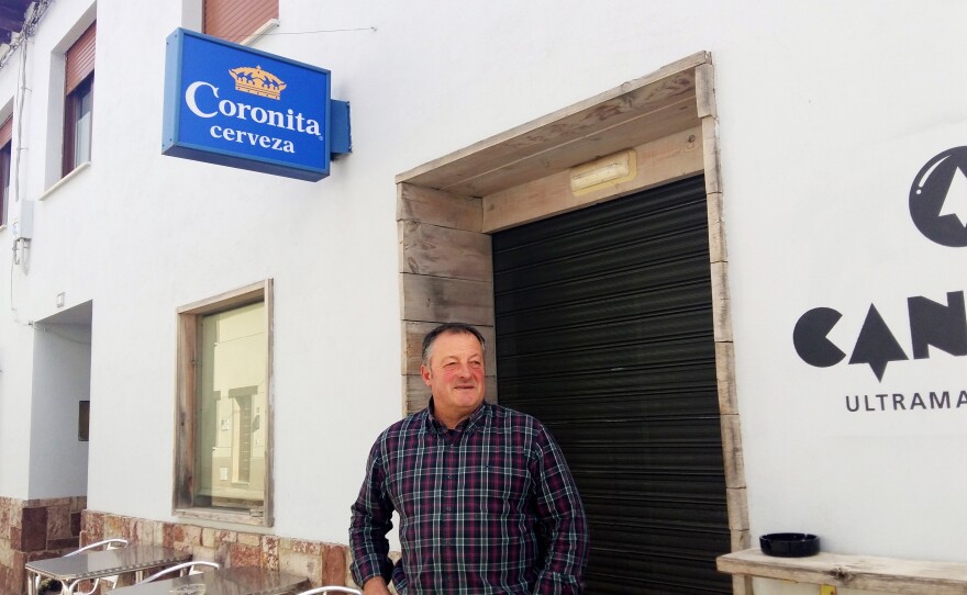 Maximino Sanchez, president of the neighborhood council in Cerezales del Condado, manages the town's only bar — which serves only Corona and Modelo beer brands. "He was just a nice guy," Sanchez says. "He didn't owe us anything."