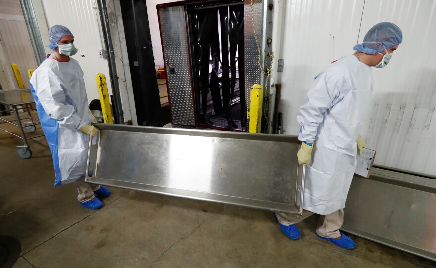 Medical examiners and coroners are the last stop for investigating unexpected deaths, including those who may have died of COVID-19. In April, the Cook County Medical Examiner opened a surge center to handle overflow from Chicago-area hospital morgues.