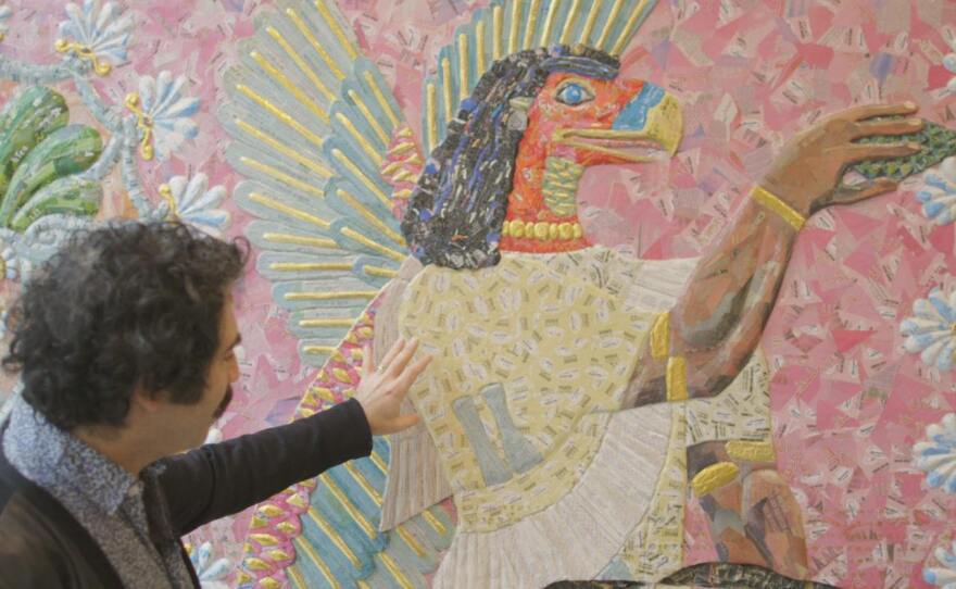 Artist Michael Rakowitz with one of his pieces that appears in the short film "Michael Rakowitz: Haunting the West."