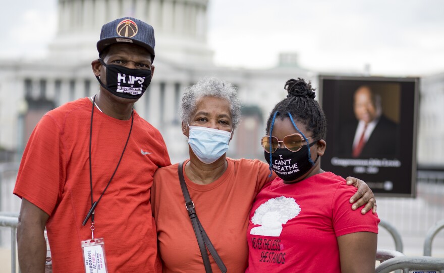 Joan Taylor, middle, is with her nephew, Randy Kier, left, and her great granddaughter, Leah Miller, right.