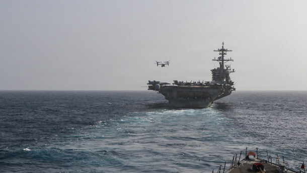 Arleigh Burke-class guided-missile destroyer USS Frank E. Petersen Jr. (DDG 121) sails behind the Nimitz-class aircraft carrier USS Abraham Lincoln (CVN 72), June 27, 2026. Frank E. Petersen Jr. is deployed to the U.S. 5th Fleet area of operations to support maritime security and stability in the Middle East.