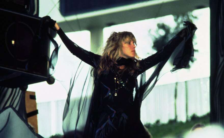 Nicks — in her signature black outfit and flowing sleeves — performs with Fleetwood Mac in May 1977.