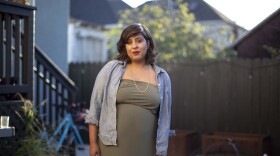 Jas Johl stands outside of her home in North Oakland in this undated photo. 