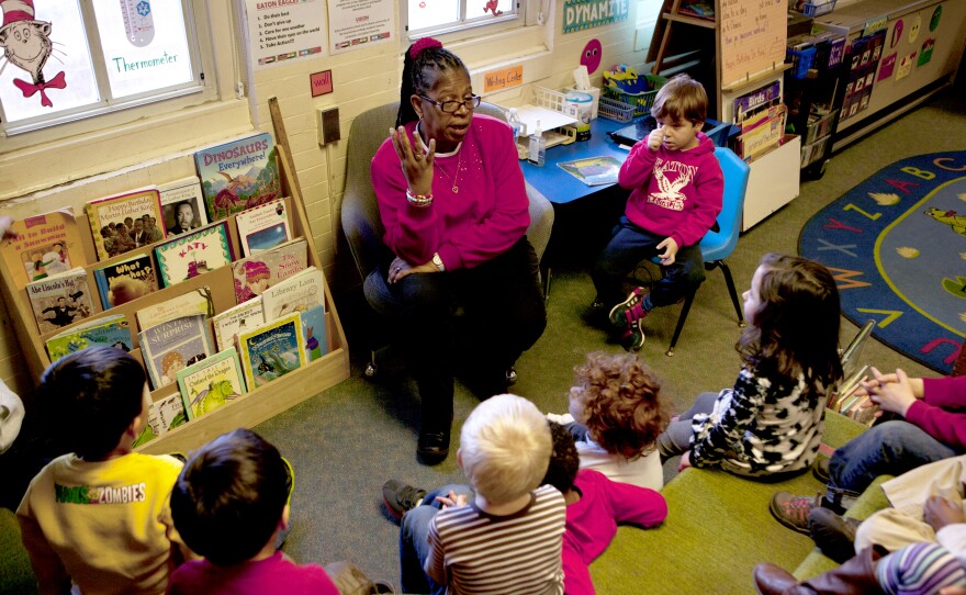 Carolyn Barnhardt teaches her prekindergarten students a song about Rev. Martin Luther King Jr. She knows some might question how deeply 4- and 5-year-olds can comprehend this history, but she says, "I think they understand."
