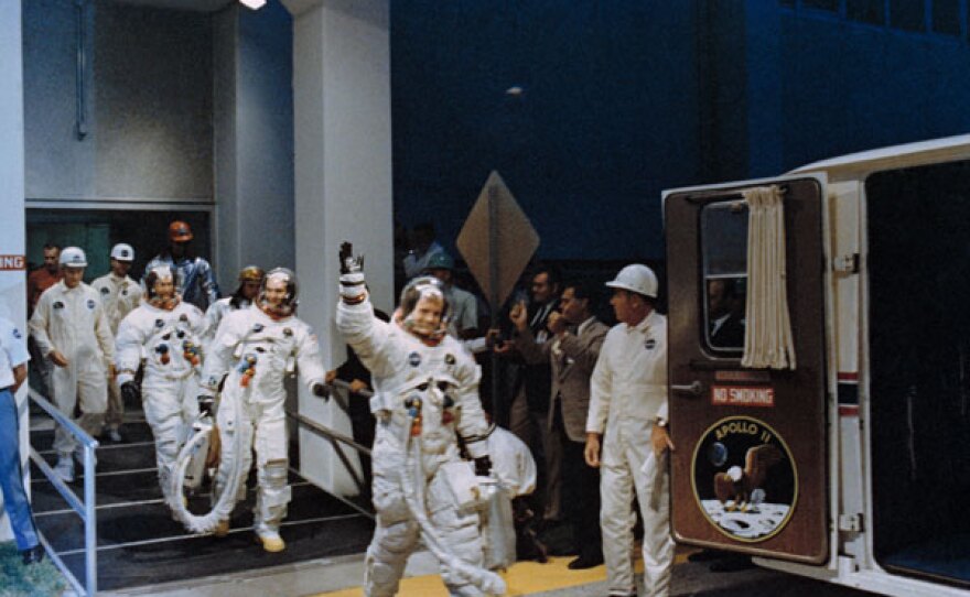 Neil Armstrong, Mike Collins and Buzz Aldrin travel to the Saturn V Rocket. Kennedy Space Center, 16 July 1969.