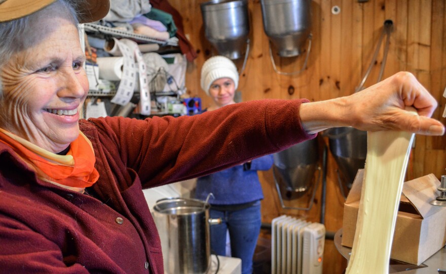 Kathy Fields, owner of Flint Hill Farm, demonstrates how to stretch mozzarella.