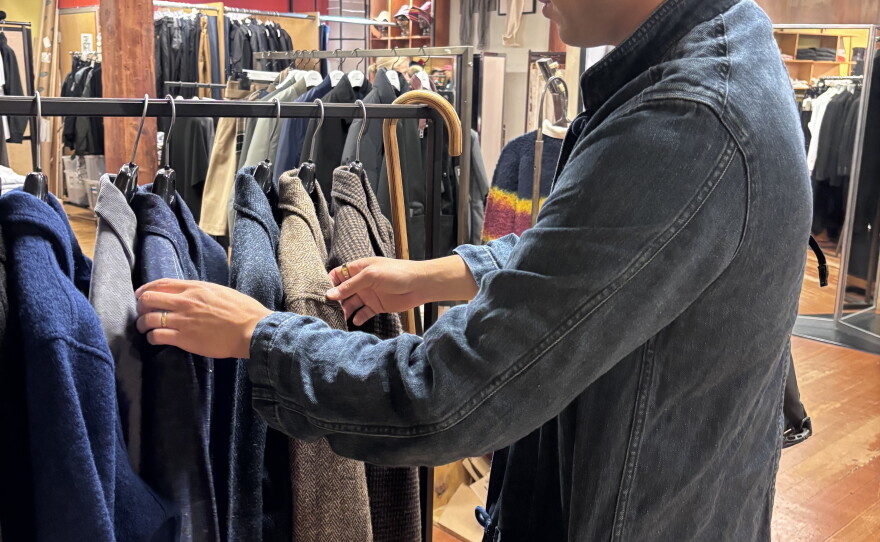 AI data analyst Edwin Zee shops for work attire.