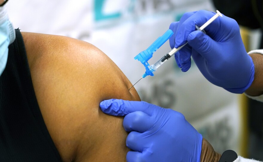 Health care workers have been throwing out the excess vaccine, fearing it would be against FDA rules to use it.