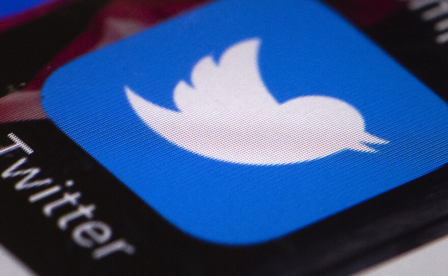 Journalist Robert Draper says White House social media director Dan Scavino has a hand in crafting about half of the president's tweets.