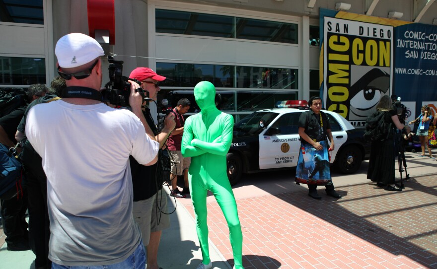 Everyone gets their 15 minutes of fame at Comic-Con, especially if you're covered in lime green head-to-toe tights.