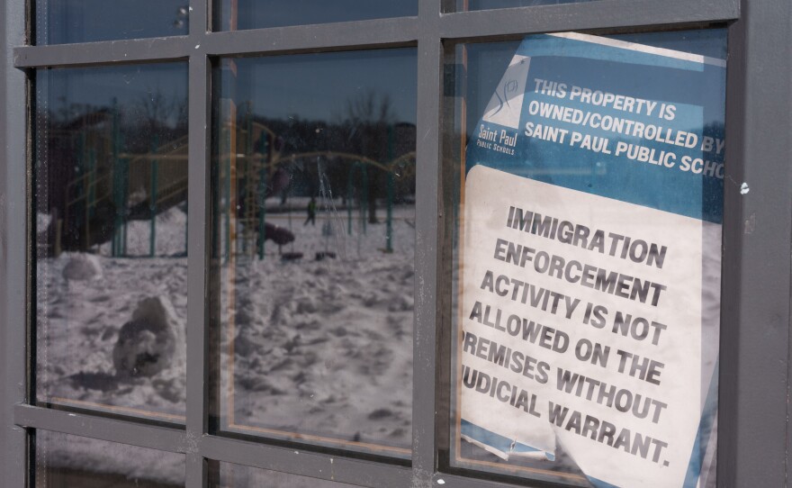 Signage bars federal immigration agents from entering the elementary school without a judicial warrant.