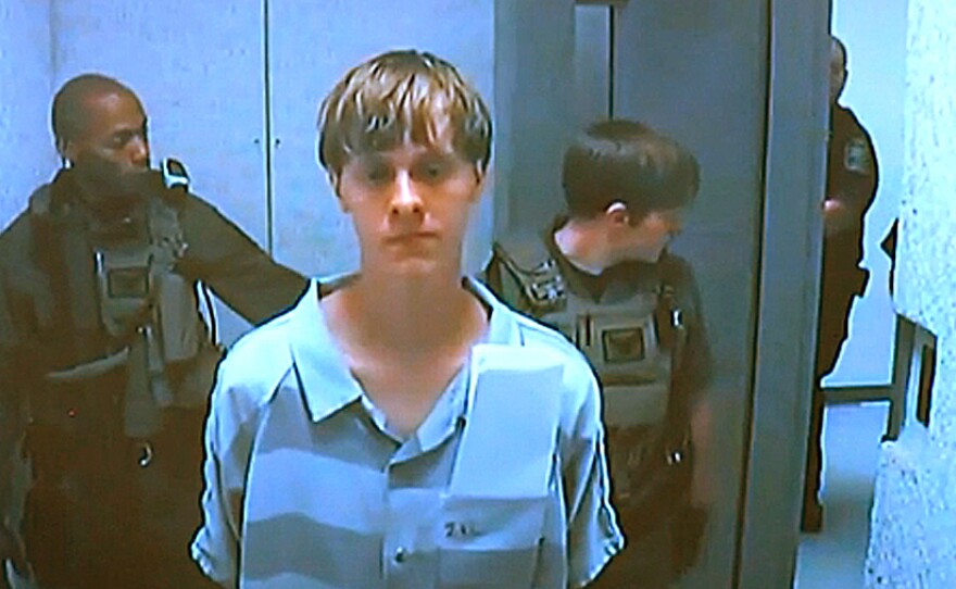 Dylann Roof appears via video before a judge in North Charleston, S.C, today. The 21-year-old man accused of killing nine people inside a black church in Charleston made his first court appearance and bail was set for $1 million on a charge of weapons possession. The judge said he did not have the authority to set bail on the nine counts of murder against Roof.