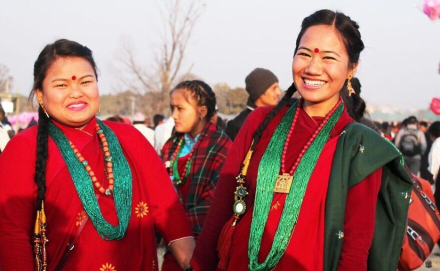 Anusha Gurung (left) and her friend Illa Gurung take part in a New Year's dance competition in Kathmandu, Nepal.