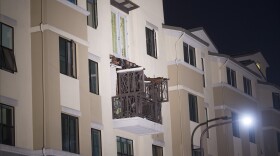 A fourth floor balcony rests on the balcony below after collapsing at the Library Gardens apartment complex in Berkeley early Tuesday, June 16, 2015. 