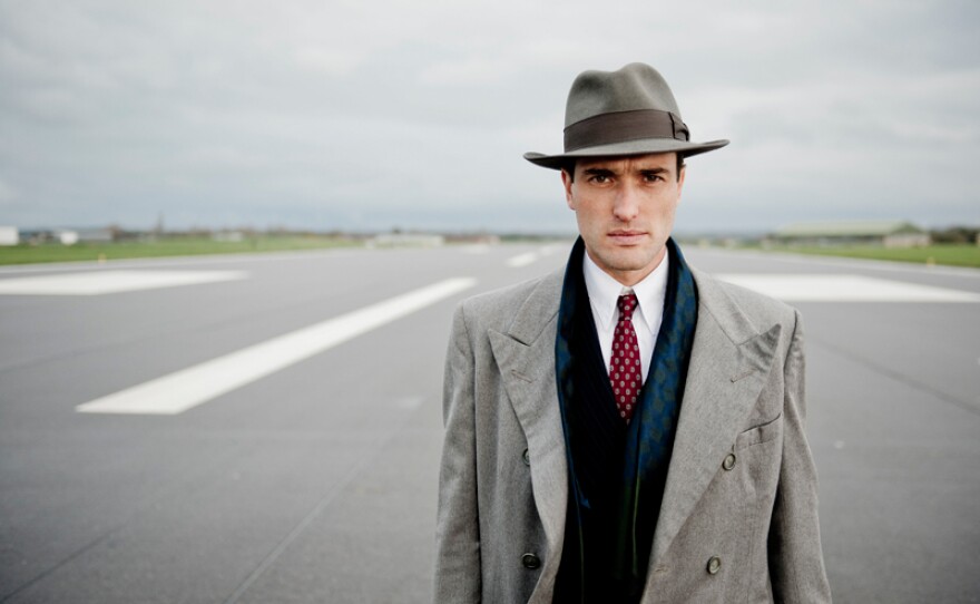 Ed Stoppard as Sir Hallam Holland.