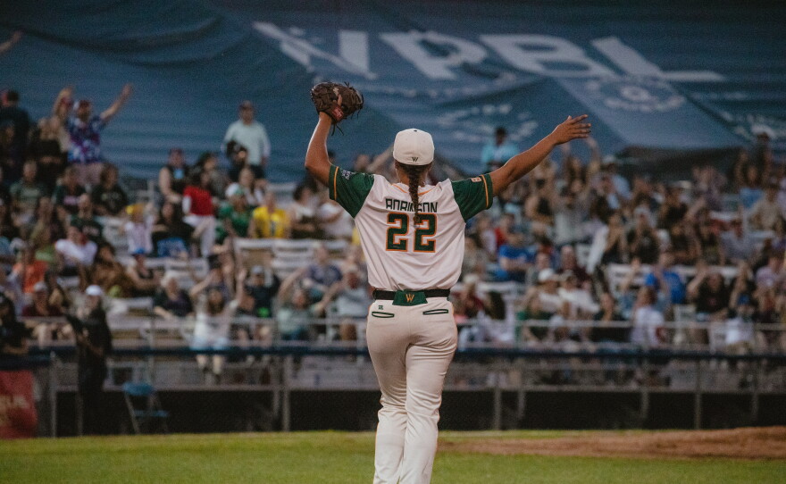 Sabrina Robinson, first basemen for the Boston Hunters, dances between innings to rile up the crowd during her team's first game in the Women's Pro Baseball League on Sunday, Aug. 2.