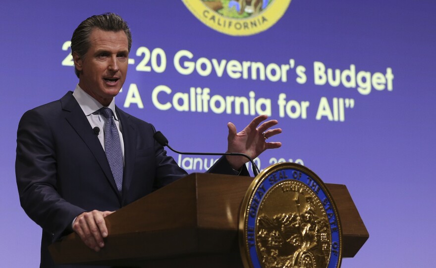 California Gov. Gavin Newsom, pictured in January, must sign off on the latest state budget by June 15. The new $213 billion plan includes an expansion of the state's Medicaid program for low-income adults under the age of 26, regardless of immigration status.