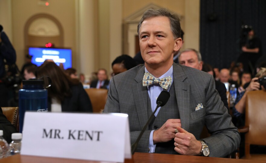 Deputy Assistant Secretary for European and Eurasian Affairs George Kent waits to testify before the House Intelligence Committee on Capitol Hill on Wednesday.