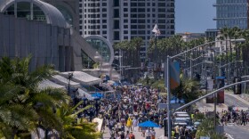 Crowds walk outside the San Diego Convention Center during Comic-Con on July 25, 2025. 