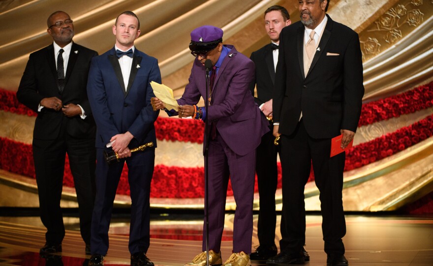 A very thrilled and excited Spike Lee picks up an Oscar for Best Adapted Screenplay for "BlackKklansman." Feb. 24, 2019