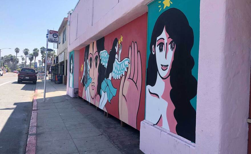 A mural by artist Fifí Martínez is situated at a busy bus stop along San Ysidro Blvd, pictured on September 25, 2020.