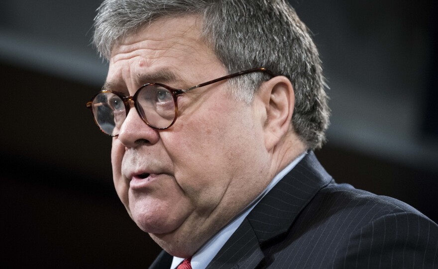 Attorney General William Barr, pictured during a news conference on Monday, tells ABC News that President Trump should stop his commentary about ongoing Justice Department cases.