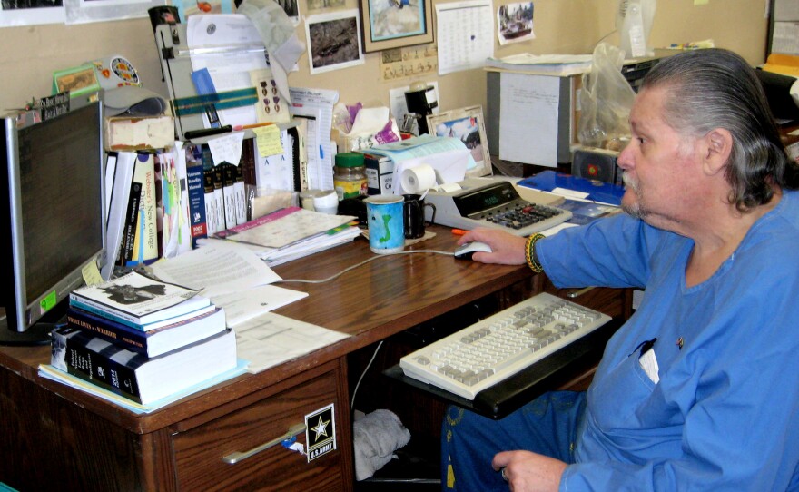 Inmate and Vietnam veteran Ed Munis works on his computer at the Veteran Service Office in California's Soledad Correctional Training Facility, which he helped start more than a decade ago.