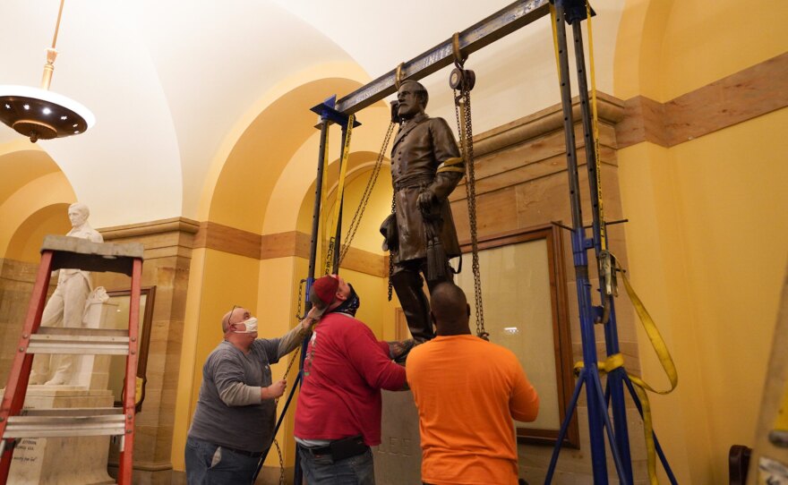 A statue of Robert E. Lee was removed from the U.S. Capitol early Monday.