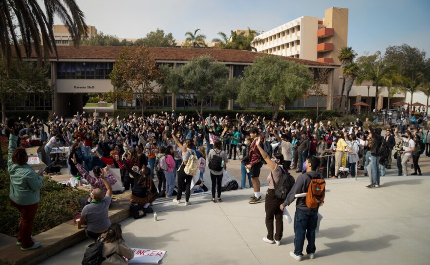 Students gathered outside of the UC Santa Barbara library Nov. 5, 2021, to protest the pending eviction of students from hotels and the construction of Munger Hall. <br/>