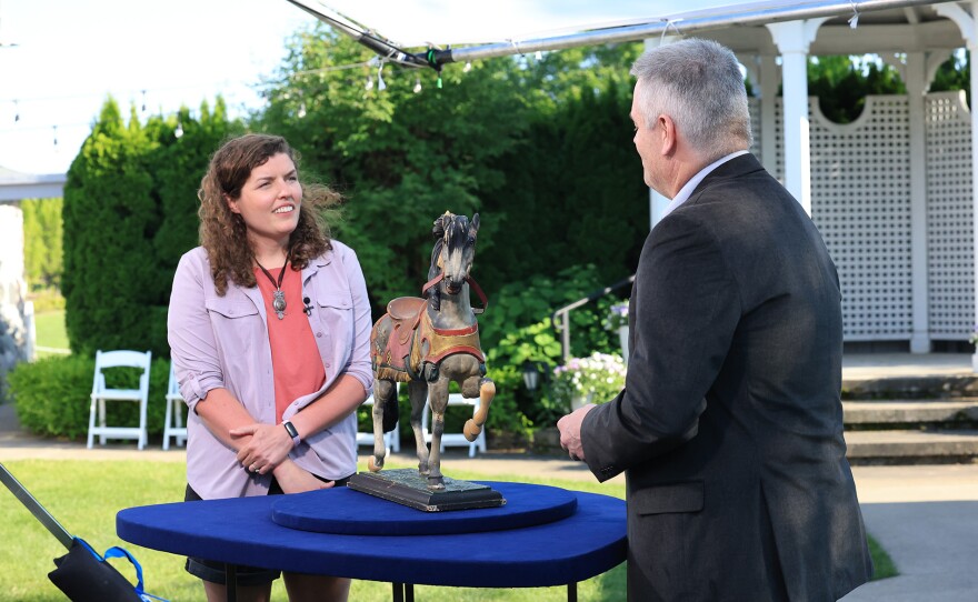 Christopher Fox (right) appraises a salesman’s model carousel horse, ca. 1925, in Charlevoix, Mich. ANTIQUES ROADSHOW “Castle Farms, Hour 1” premieres Monday, March 30 at 8/7C PM on PBS.