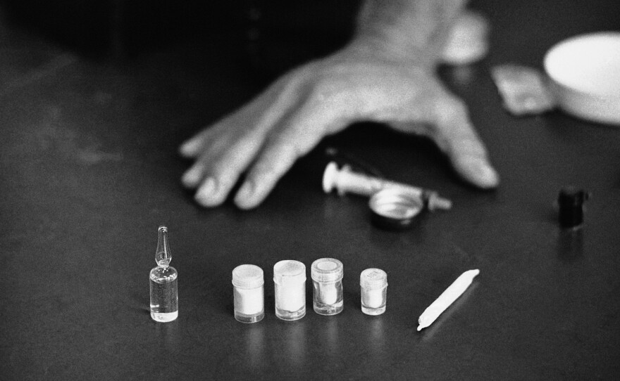 Vials of heroin and a marijuana joint shown in Saigon in 1971.
