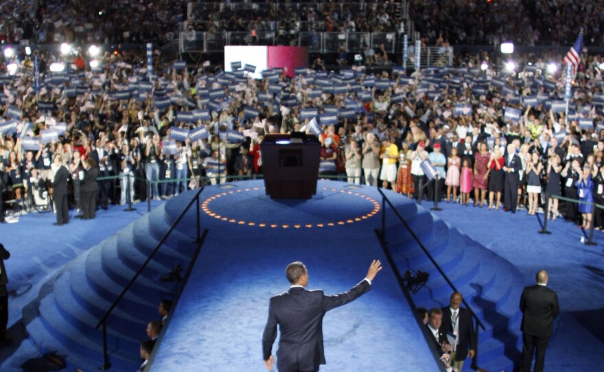 President Obama walks to the podium at his 2008 nominating convention. Lawmakers are inserting into the spending bill a provision allowing political parties to collect up to $97,200 from each donor to pay for their conventions.