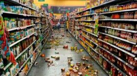 Food that fell from the shelves litters the floor of an aisle at a Walmart following an earthquake in Yucca Yalley July 5, 2019.