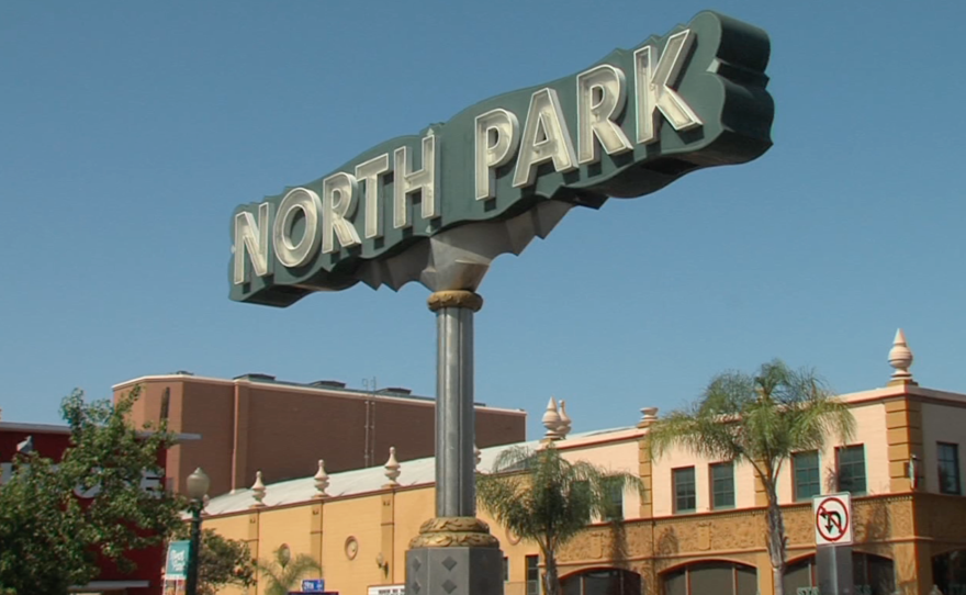 The North Park neighborhood sign stands at University Avenue and 29th Street, June 28, 2016.